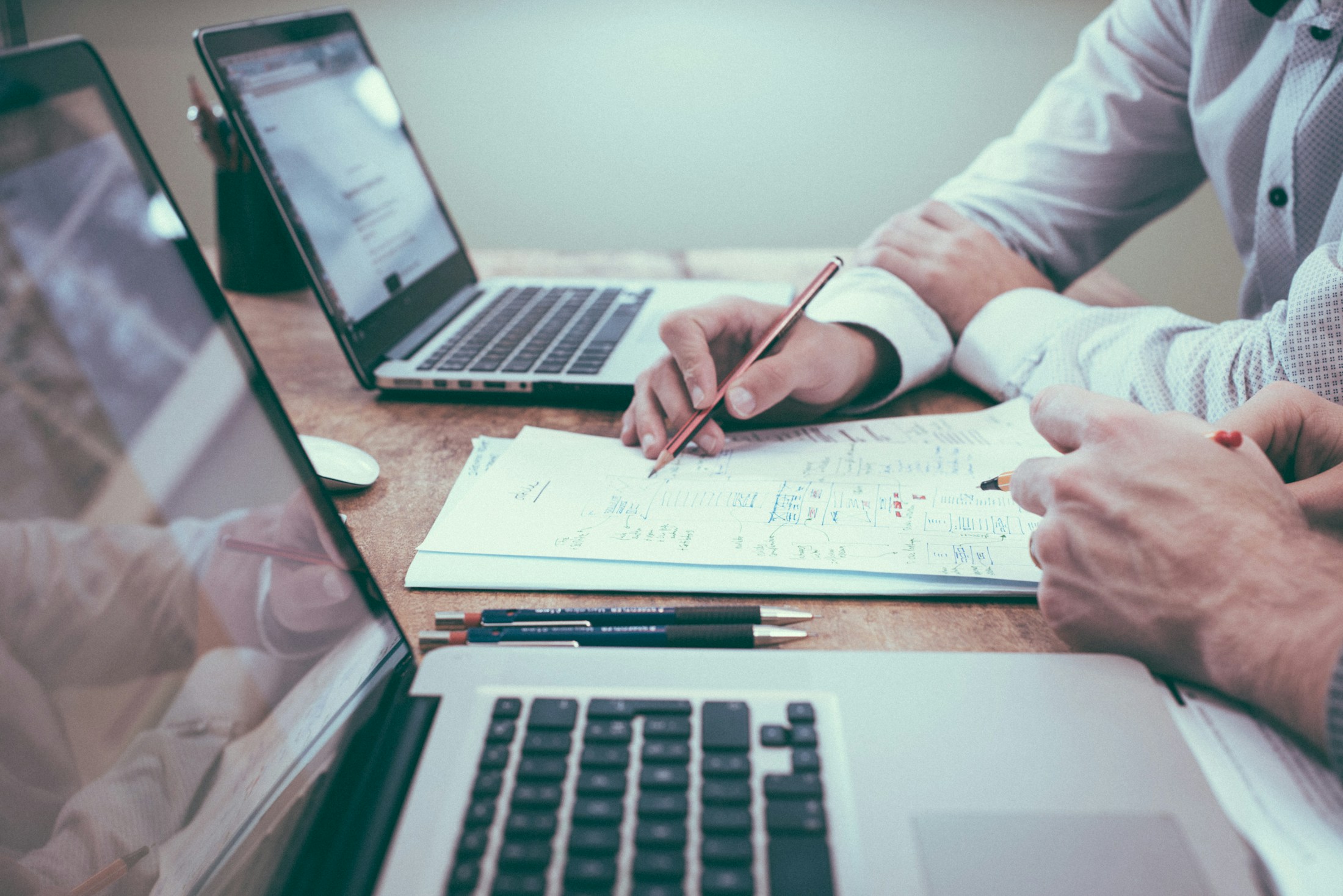 Business owner planning with spreadsheets